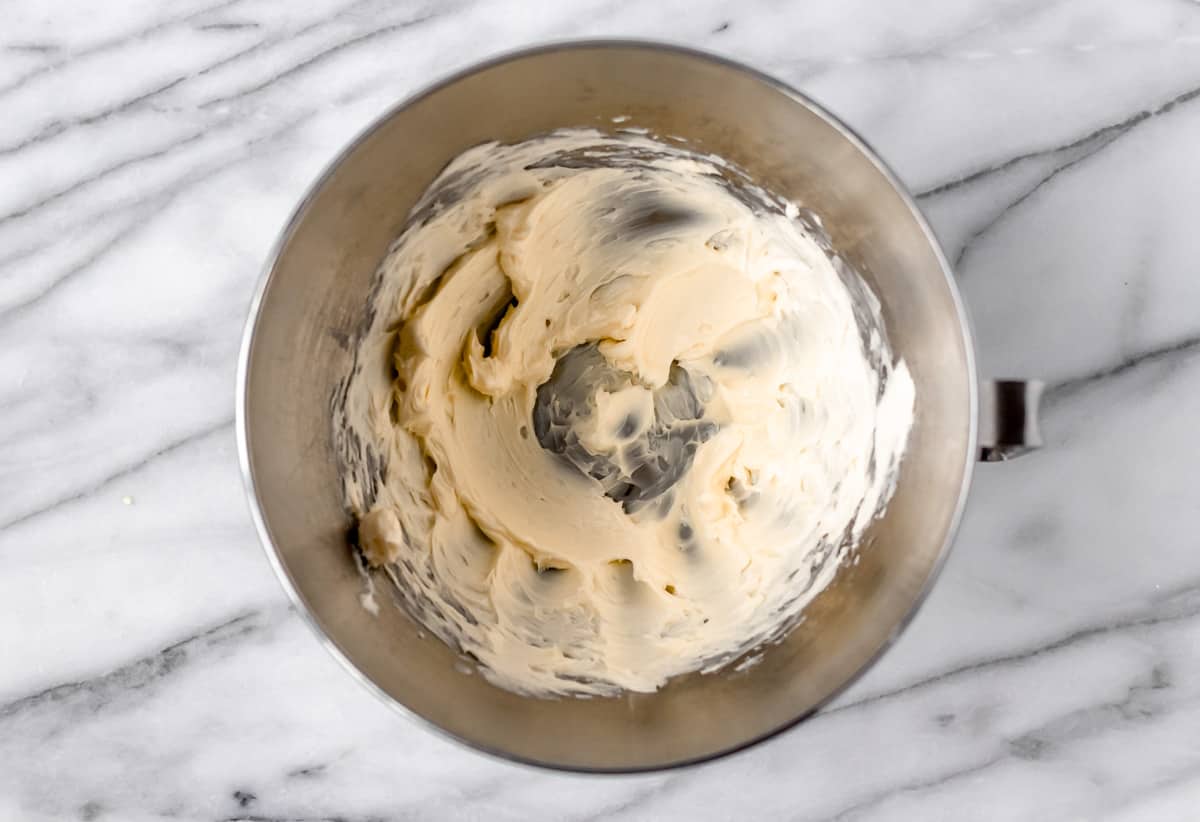 Creamed butter in a silver bowl.