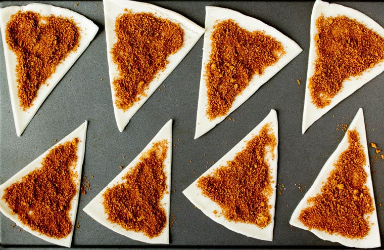Pie crust triangles topped with a cinnamon sugar mixture