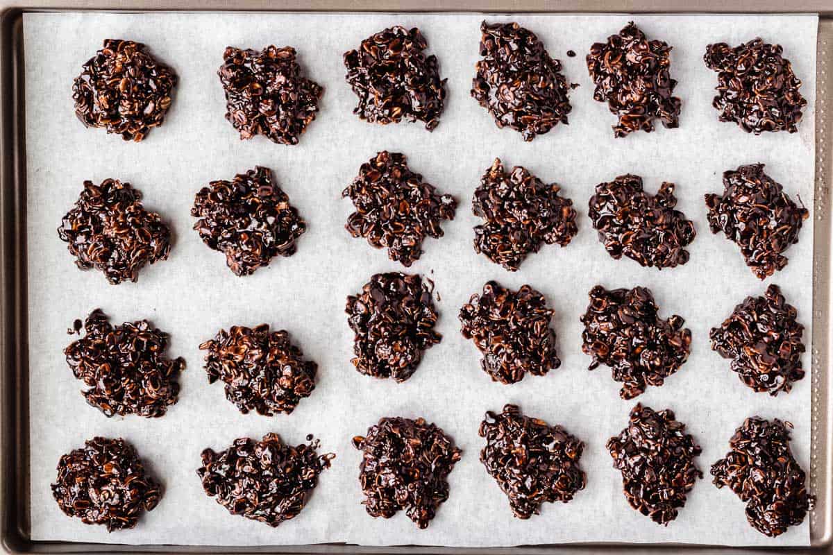 No-Bake Cookies on a parchment paper lined baking sheet