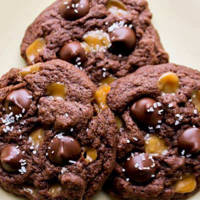 3 Gluten Free Salted Caramel Chocolate Chip Cookies Close Up on a White Background