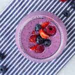 Mixed Berry Smoothie on a blue and white striped napkin