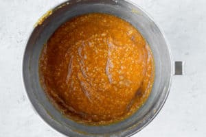 Pumpkin cake batter in a mixing bowl