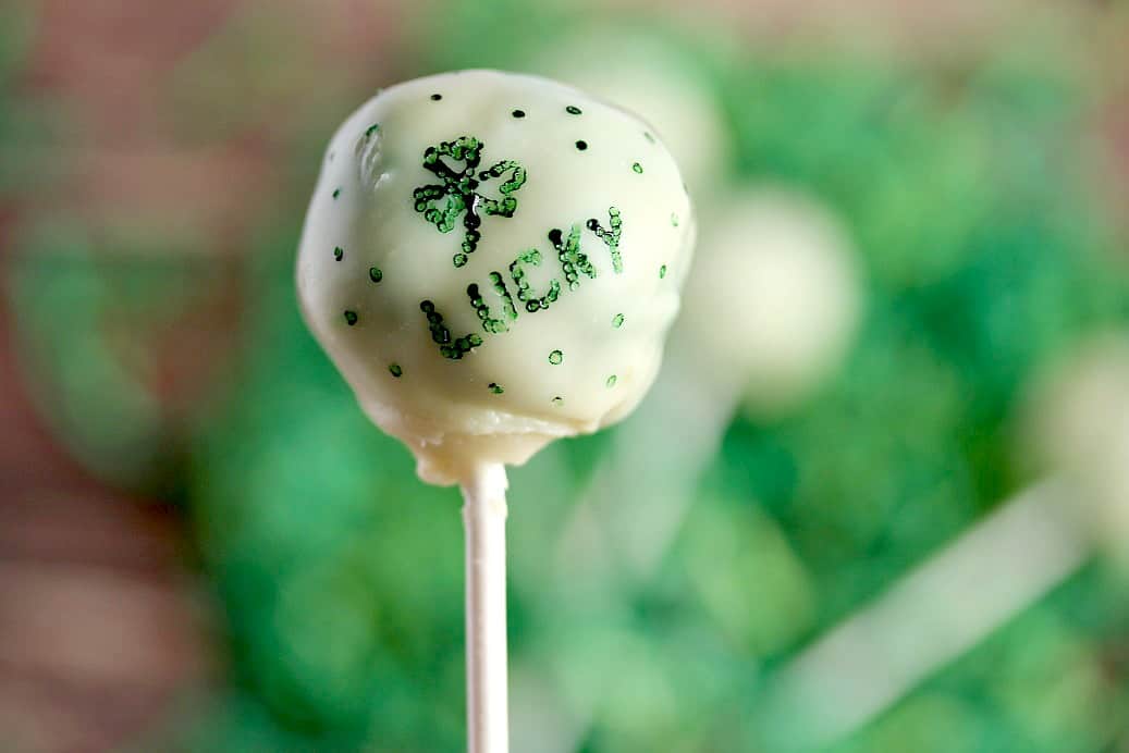 St. Patrick's Cake Pop close up with more blurred in the background