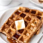 Chocolate and peanut butter waffles on a plate with text overlay.