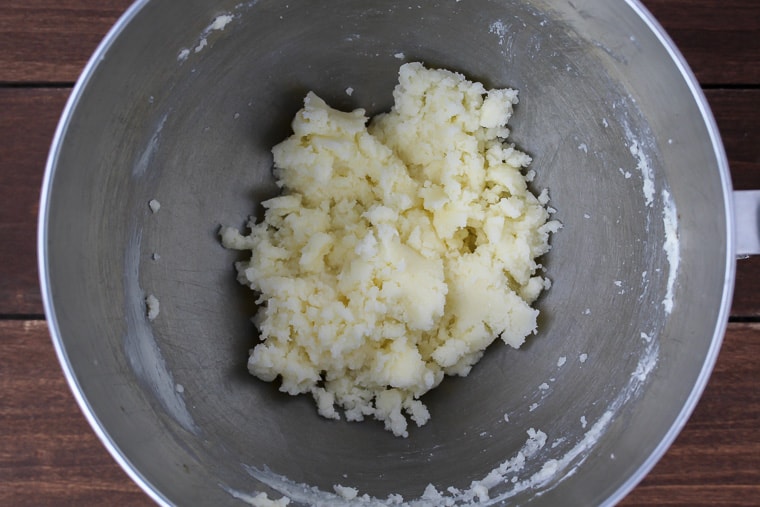 Butter and sugar blended in a silver bowl