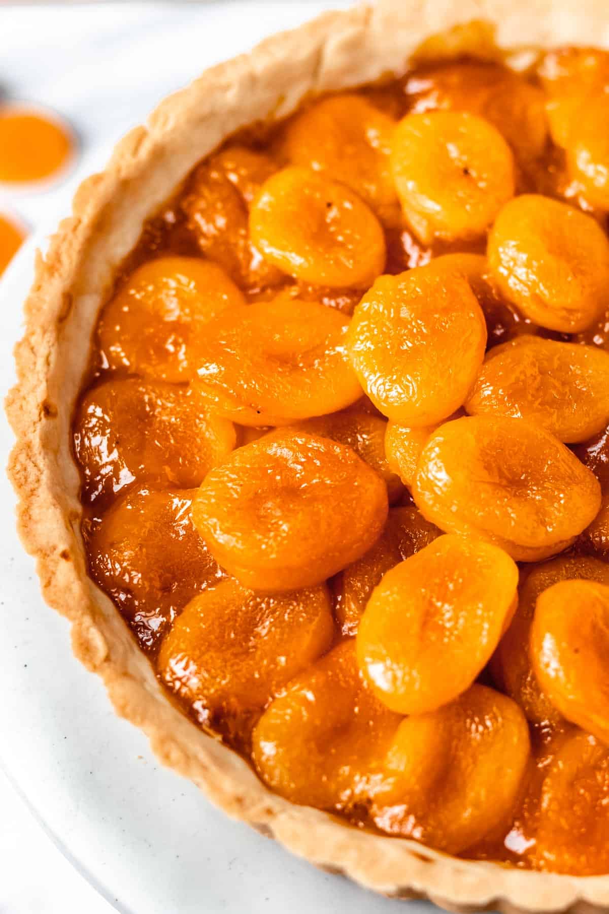 Close up of a baked apricot tart.