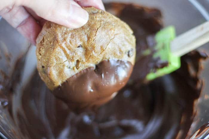 Dipping Cookies into the Melted Chocolate