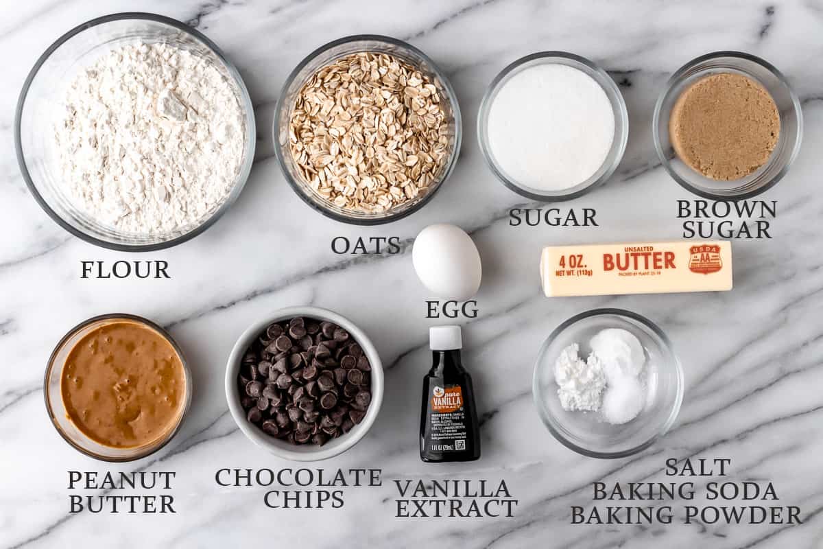 Ingredients to make oatmeal peanut butter chocolate chip cookies with text overlay.