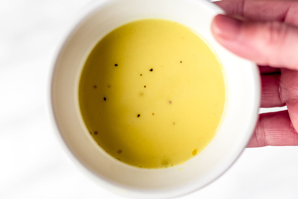 Lemon Mustard Dressing in a small white bowl