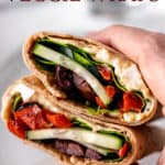 A Greek veggie wrap with text overlay.