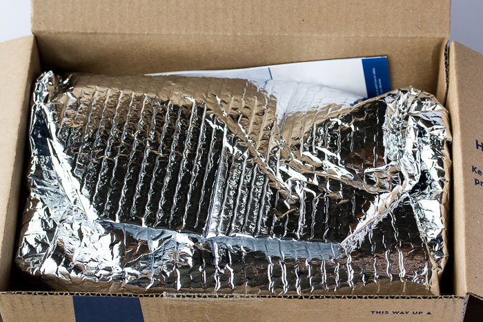 A Blue Apron Box with Sealed Insulated Packaging