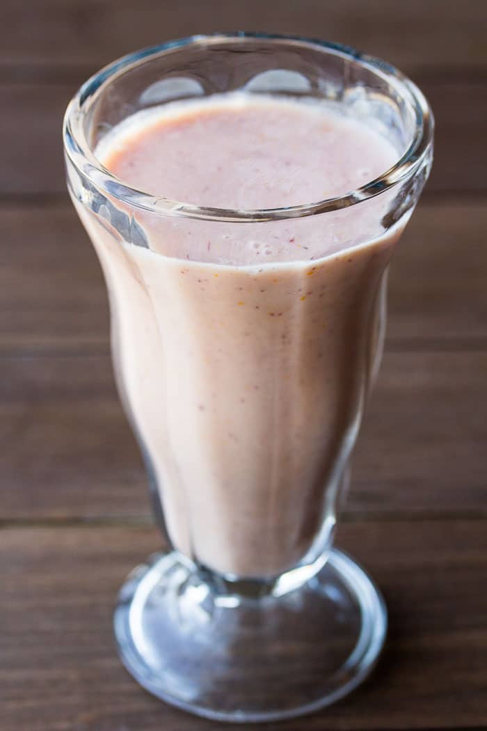 Home Chef's Orange Cranberry Smoothie in a Tall Glass