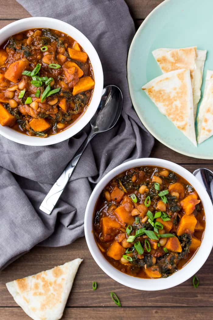 Blue Apron Spicy Sweet Potato Chili in Two Bowls with a Green Plate and Gray Napkin