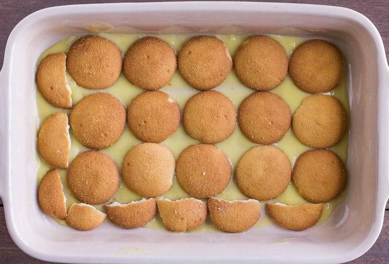 A layer NILLA Wafer Cookies on vanilla pudding in a rectangular baking dish