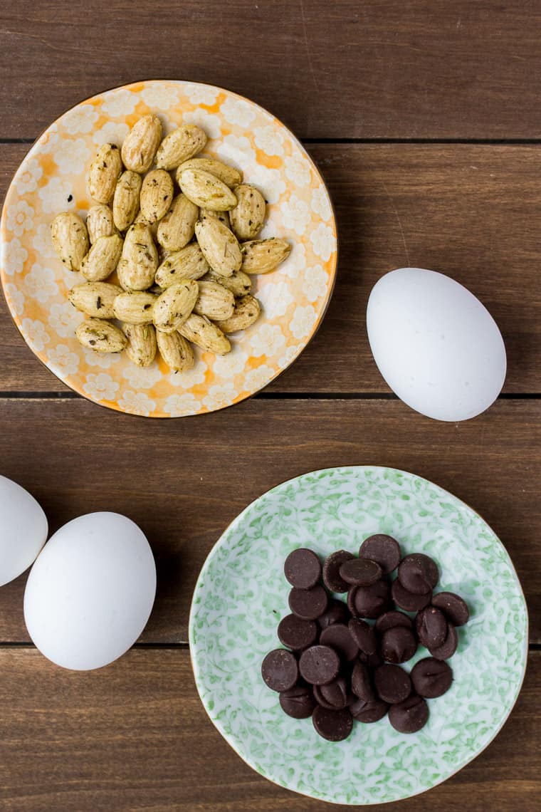 Almonds, Chocolate, and Eggs on a Wood Backdrop