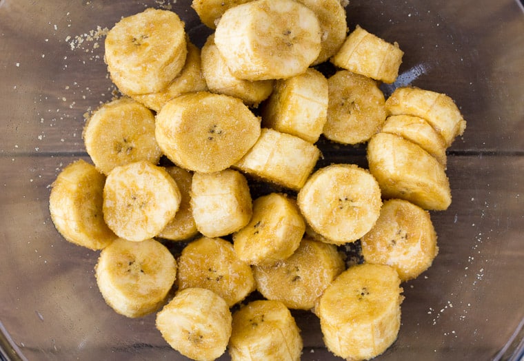 Raw Plantains Tossed with Brown Sugar in a silver bowl