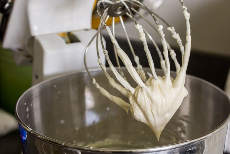 Cake Icing on the Whisk of an Electric Mixer