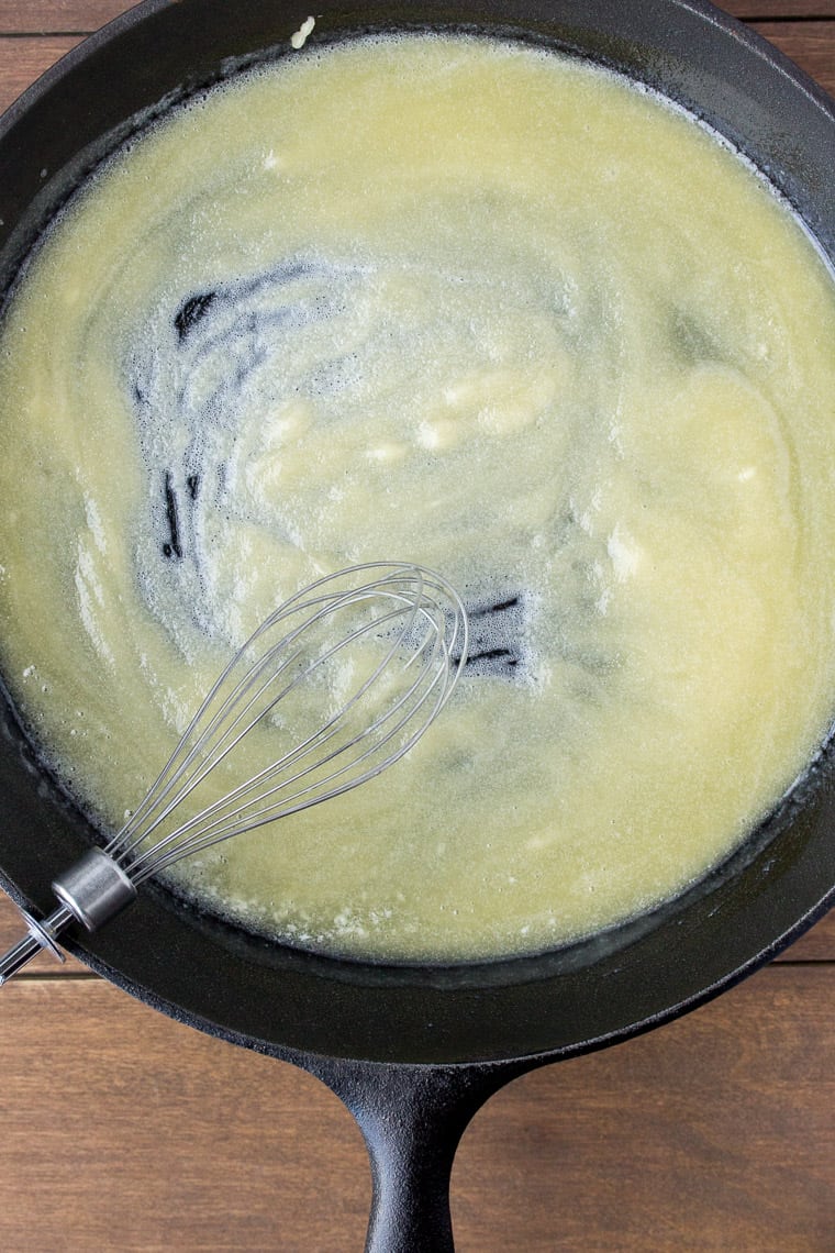 Butter and Flour in a Cast Iron Skillet with a Whisk