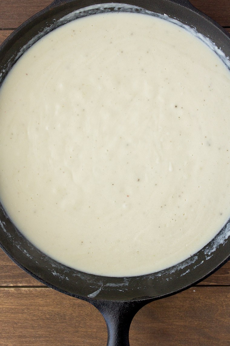 Thickened Sauce Before Cheese is Added in a Cast Iron Skillet