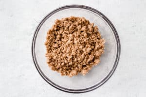 Chai crumb topping in a glass bowl