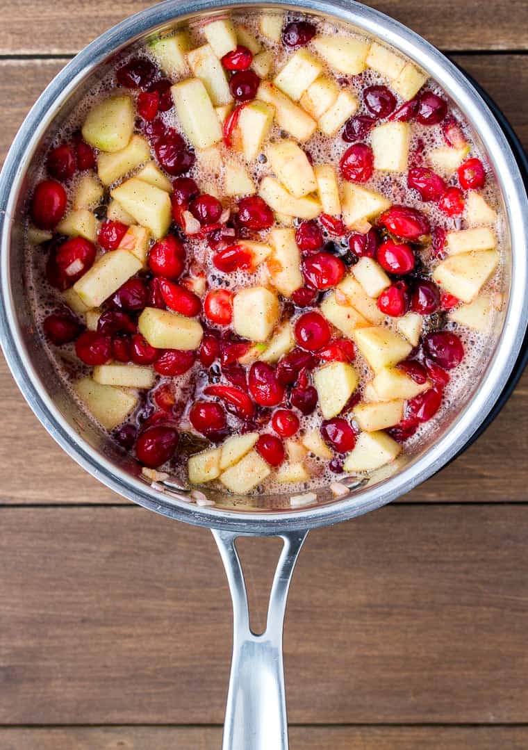 Apples and Raisin added to the pot with the cranberries