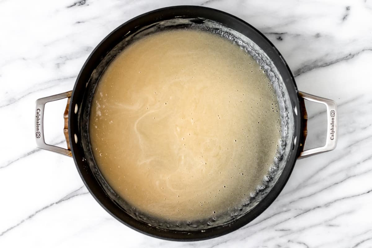 Melted butter and flour in a large, deep skillet.