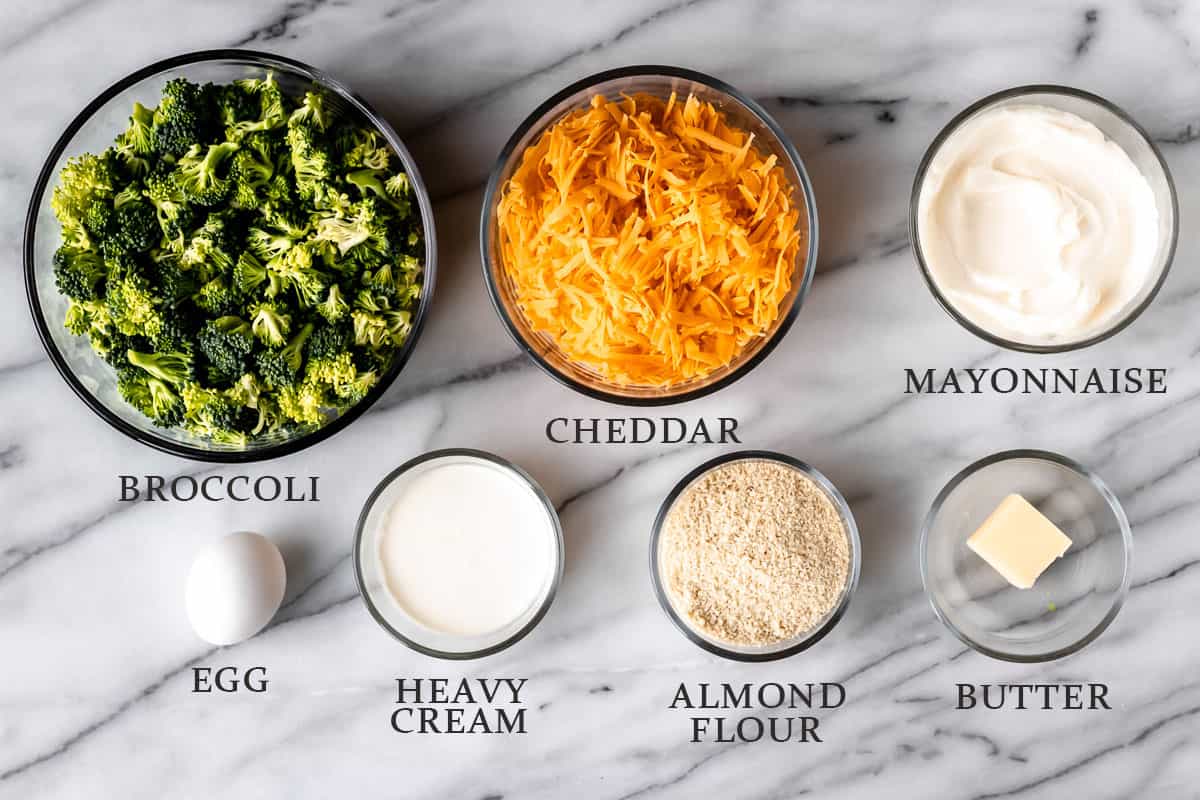 Ingredients to make keto broccoli casserole with text overlay.