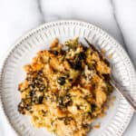 Keto broccoli casserole on a plate with text overlay.