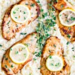 Skillet Creamy Lemon Chicken with Cauliflower in a Skillet Topped with Fresh Thyme