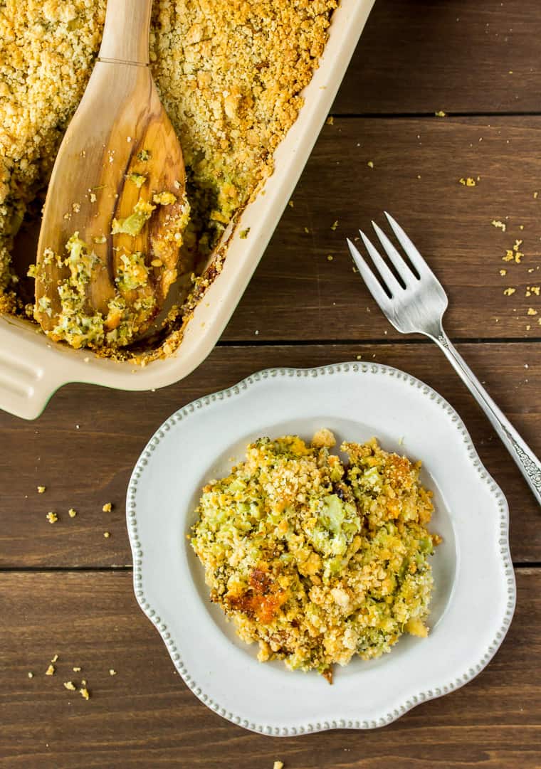 Keto Broccoli Casserole in a Baking Dish with a Serving on a Plate