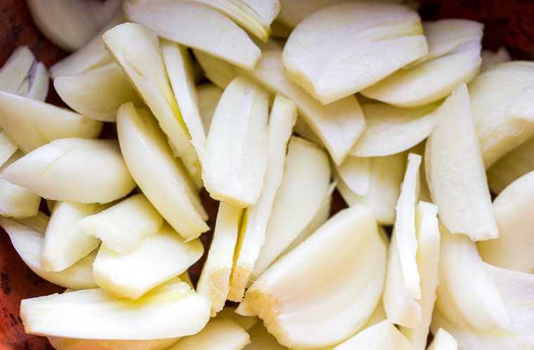 Close up of thinly sliced garlic