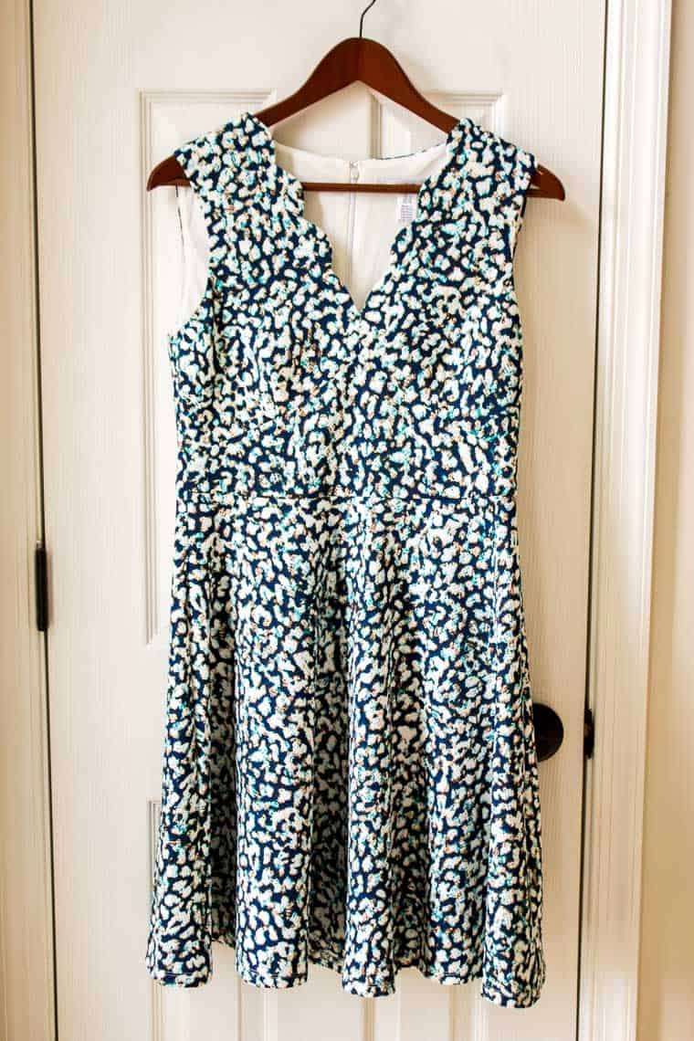 Stitch Fix Wisp Cleo Textured Knit Dress in multi-color print on a wood hanger in front of a white door