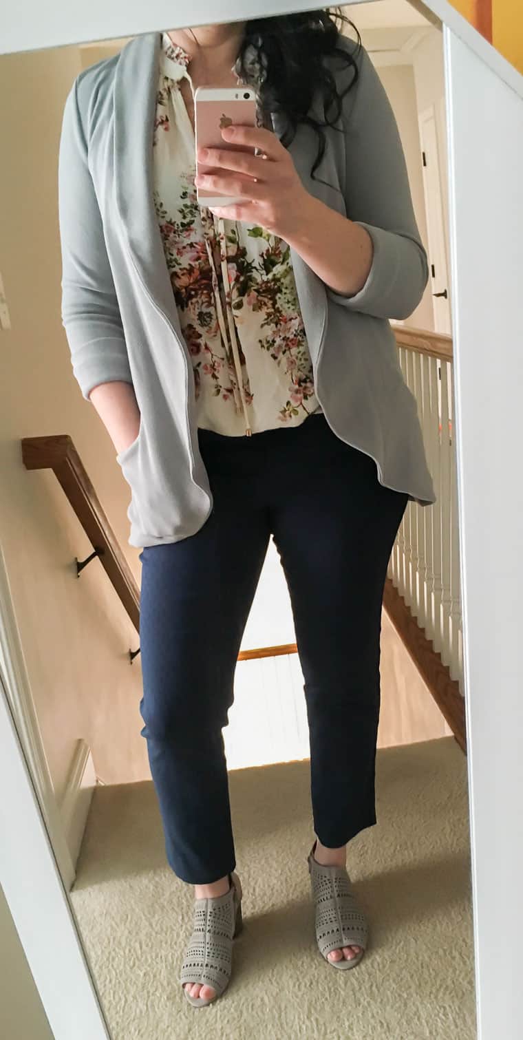 Outfit image of blue pants, cream shirt and gray blazer