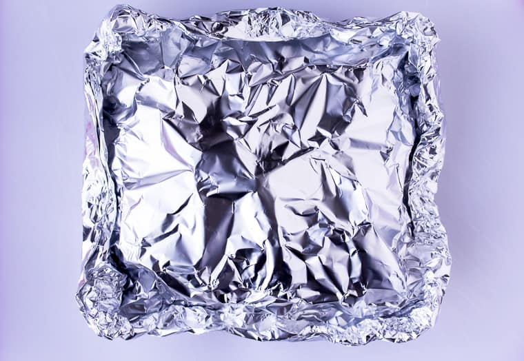 Foil packet all wrapped up on a white background