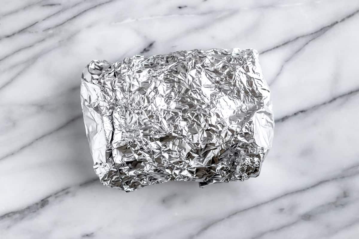 A foil packet in a marble background.