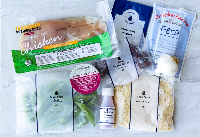 Ingredients for Blue Apron Mediterranean Chicken & Orzo on a white background