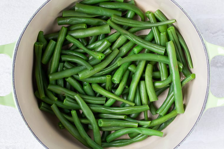 Cooked green beans in a Dutch oven