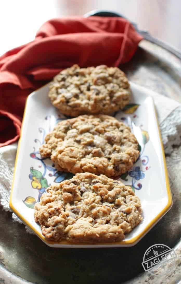 Cowboy Cookies on a white tray with a red napkin in the background