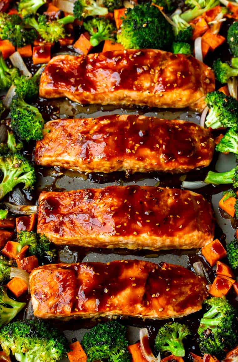 Sheet Pan Teriyaki Salmon with Veggies on a gray sheet pan