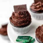 Chocolate Mint Cupcakes on a cake stand with text overlay.