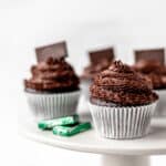 Chocolate Mint Cupcakes on a cake stand with text overlay.