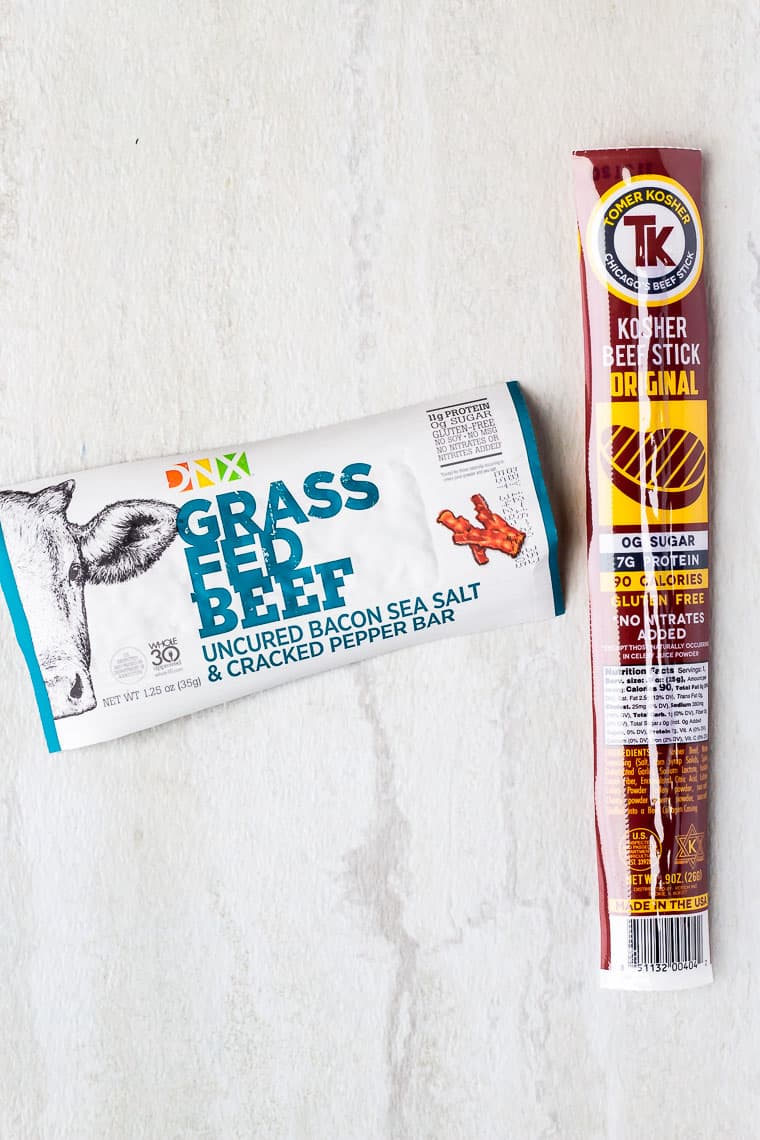 A dnx bar and beef stick on a white background