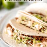 Asian pork tacos on a plate with text overlay.