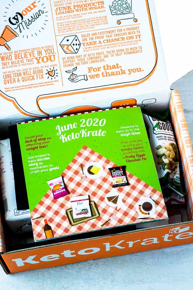 Keto Krate opened to show the June 2020 pamphlet inside and the products under it