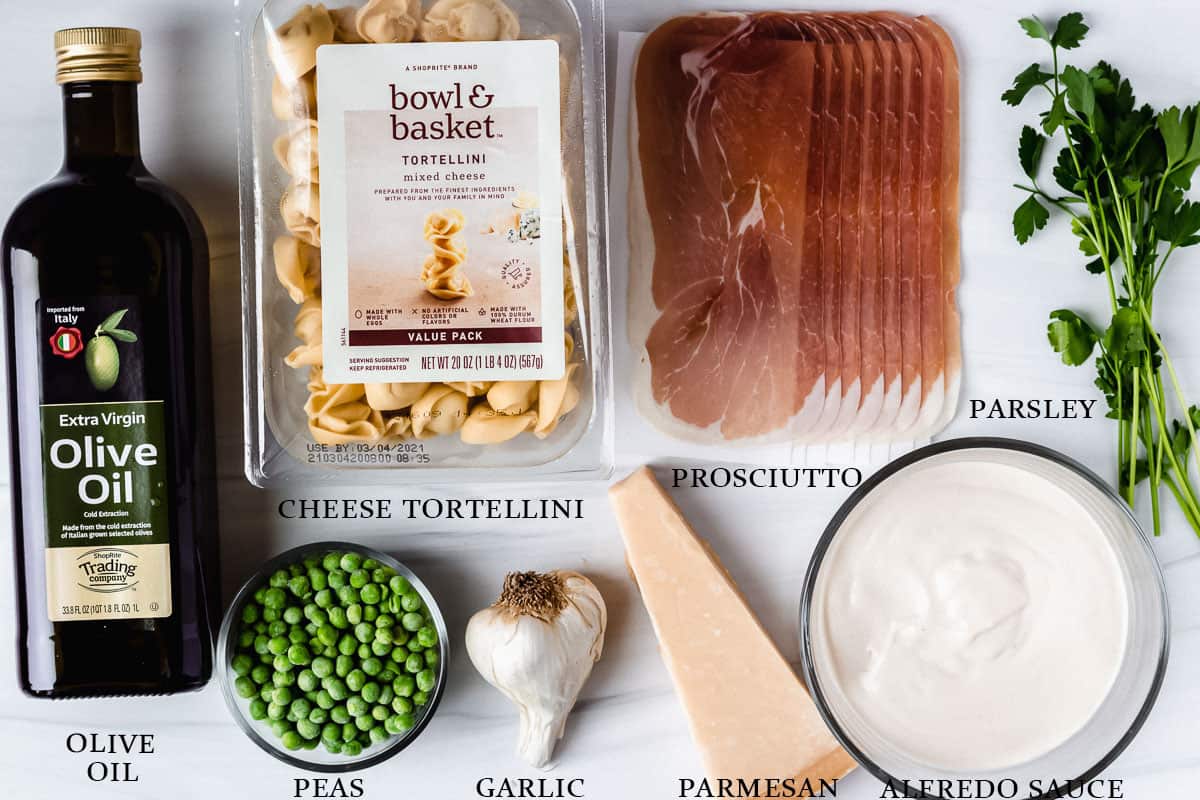 Ingredients to make tortellini alfredo labeled on a white background