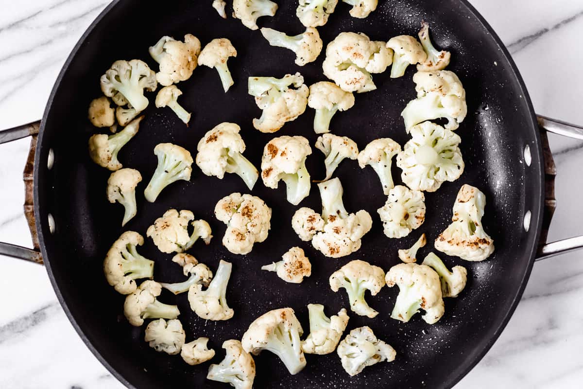cauliflower browned in a skillet