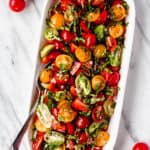 Tomato basil salad with text overlay