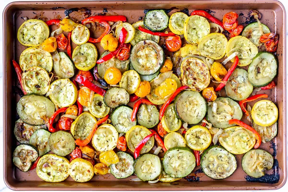 Roasted summer vegetables on a sheet pan
