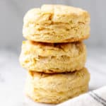 a stack of 3 country biscuits on a gray background