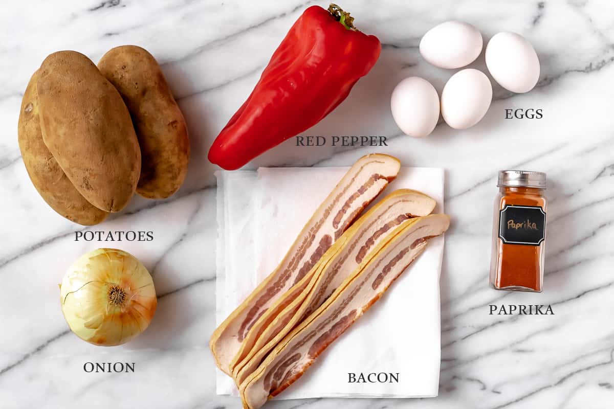 Ingredients needed to make breakfast potato hash with text overlay